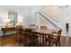 Spacious dining room featuring hardwood floors and a long dining table at 1824 Mount Paran Nw Rd, Atlanta, GA 30327