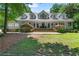 Beautiful home with a large front yard and inviting front porch at 1824 Mount Paran Nw Rd, Atlanta, GA 30327