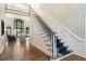 Elegant foyer with a grand staircase and soaring windows at 1824 Mount Paran Nw Rd, Atlanta, GA 30327