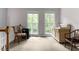 Sitting area with hardwood floors, large windows, and comfortable seating at 1824 Mount Paran Nw Rd, Atlanta, GA 30327