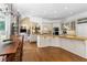 Open concept kitchen with butcher block counters and view of living room beyond at 1824 Mount Paran Nw Rd, Atlanta, GA 30327