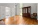 Spacious living room featuring hardwood floors, large windows, and ample natural light at 1824 Mount Paran Nw Rd, Atlanta, GA 30327