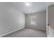Neutral bedroom with a window provides a blank canvas for personalization and relaxation at 3458 Carriage Chase Rd, Atlanta, GA 30349