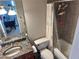 Bathroom featuring a granite vanity, a toilet and a shower with a shower curtain at 2479 Peachtree Ne Rd # 1714, Atlanta, GA 30305
