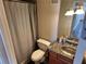 A functional bathroom with a shower, toilet, and granite countertop vanity at 2479 Peachtree Ne Rd # 1714, Atlanta, GA 30305