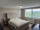 Well-lit bedroom features a comfortable bed and scenic outside view through a bright window at 2479 Peachtree Ne Rd # 1714, Atlanta, GA 30305