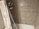 Shower with tile surround and a shower curtain at 2479 Peachtree Ne Rd # 1714, Atlanta, GA 30305