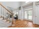 Spacious foyer with hardwood floors, tall ceilings, and double doors at 2693 Blairsden Nw Pl, Kennesaw, GA 30144