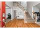 Inviting foyer with hardwood floors, staircase, and lots of natural light at 2693 Blairsden Nw Pl, Kennesaw, GA 30144