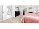 Large primary bedroom boasting an en suite bathroom with a soaking tub and walk-in closet at 2693 Blairsden Nw Pl, Kennesaw, GA 30144