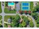 Overhead view of the neighborhood highlighting community amenities, mature trees, and winding roads at 4313 Deep Springs Nw Ct, Kennesaw, GA 30144