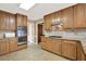 Well-equipped kitchen with modern appliances, granite countertops, and custom cabinets at 4313 Deep Springs Nw Ct, Kennesaw, GA 30144