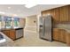 Spacious kitchen with granite counters, stainless steel appliances, and ample cabinet space at 4313 Deep Springs Nw Ct, Kennesaw, GA 30144