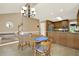 Bright kitchen with an adjacent breakfast nook features skylights, wood table and lots of windows at 4313 Deep Springs Nw Ct, Kennesaw, GA 30144