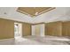Spacious bedroom with coffered ceiling and views to the en-suite bath at 4313 Deep Springs Nw Ct, Kennesaw, GA 30144