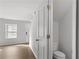 Compact bathroom with a modern toilet and neutral decor at 7238 Crestside Dr, Austell, GA 30168