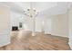 Open-concept living area with new floors, fireplace, and great natural lighting at 910 Laurel Cove Dr, Snellville, GA 30078