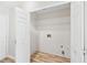 Large, well-lit pantry has plenty of room for storage and organization at 910 Laurel Cove Dr, Snellville, GA 30078