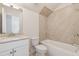 Bathroom featuring a single sink vanity and a tiled tub and shower combo at 3182 Hartford Mill Pl, Duluth, GA 30097