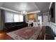 Spacious living room with fireplace, large rug, and comfortable seating at 3770 Falling Leaf Ln, Cumming, GA 30041