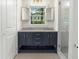 Bathroom boasting a double sink vanity, with a neutral color palette and bright gold hardware at 55 Cooper Lake Rd, Mableton, GA 30126