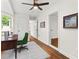 Home office boasting hardwood floors, natural light, and an adjacent room at 55 Cooper Lake Rd, Mableton, GA 30126