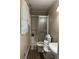 Bathroom with a sliding glass door shower at 726 Shoreline Se Trl, Conyers, GA 30094