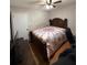 Bedroom with a wooden bed frame and TV at 726 Shoreline Se Trl, Conyers, GA 30094
