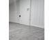 A view of unfinished basement with wood flooring and wall paneling at 1917 Penelope Nw Rd, Atlanta, GA 30314