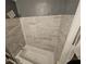 An updated bathroom with a tiled shower-tub combo and modern fixtures at 1917 Penelope Nw Rd, Atlanta, GA 30314