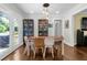 Bright dining area featuring hardwood floors, pendant lighting, and modern furnishings at 2011 Lexington Ave, Atlanta, GA 30344