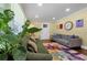 Cozy living room filled with natural light, a colorful rug, and stylish decor at 2011 Lexington Ave, Atlanta, GA 30344
