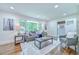 Cozy living room featuring hardwood floors, large window, and comfortable seating at 2011 Lexington Ave, Atlanta, GA 30344