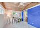 Bright sun room featuring a decorative floor, accent brick wall and beamed ceiling at 2011 Lexington Ave, Atlanta, GA 30344