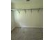 Spacious walk-in closet with ample storage space and plush neutral carpeting at 6900 Rockland Rd, Stonecrest, GA 30038