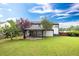 A beautiful backyard showcasing a covered patio, ideal for Gathering gatherings and outdoor enjoyment at 8320 Mayfern Dr, Fairburn, GA 30213