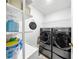 Bright and efficient laundry room with modern washer and dryer at 8320 Mayfern Dr, Fairburn, GA 30213