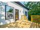 Expansive back deck with wooden railings and backyard access, perfect for outdoor enjoyment at 115 Dahlia Nw Ave, Atlanta, GA 30314