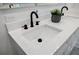 Bathroom featuring a double sink vanity with a white countertop and black hardware at 115 Dahlia Nw Ave, Atlanta, GA 30314