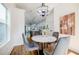 Bright dining room and kitchen in a modern home design at 115 Dahlia Nw Ave, Atlanta, GA 30314