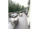 Spacious back deck with comfortable seating and an umbrella-covered table, perfect for outdoor entertaining at 124 Gorham Gates Ct, Hiram, GA 30141