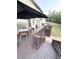 Multi-level back deck with dining area and stairs leading to the yard, ideal for outdoor gatherings at 124 Gorham Gates Ct, Hiram, GA 30141