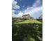 Expansive backyard with well-maintained lawn and a fenced perimeter at 124 Gorham Gates Ct, Hiram, GA 30141