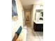 Bathroom featuring a vanity with decor; neutral color palette leads to additional rooms at 124 Gorham Gates Ct, Hiram, GA 30141