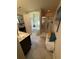 Bright bathroom featuring a tub with sheer curtains and a tiled shower with a glass door at 124 Gorham Gates Ct, Hiram, GA 30141