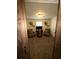 A bonus room with two arm chairs, decorative wall art, and a view through rustic wooden doors at 124 Gorham Gates Ct, Hiram, GA 30141