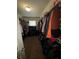 Walk-in closet with shelves and hanging rods; ideal for organizing clothes and accessories at 124 Gorham Gates Ct, Hiram, GA 30141