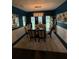 Formal dining room featuring a modern chandelier and accent wall paint at 124 Gorham Gates Ct, Hiram, GA 30141
