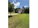 Charming two-story home with a manicured lawn, brick accents, and a welcoming front porch at 124 Gorham Gates Ct, Hiram, GA 30141