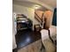 Hallway leading to the second floor with custom desk and shelving area at 124 Gorham Gates Ct, Hiram, GA 30141